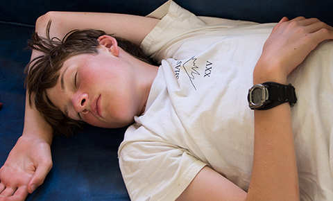 A sleeping teen
